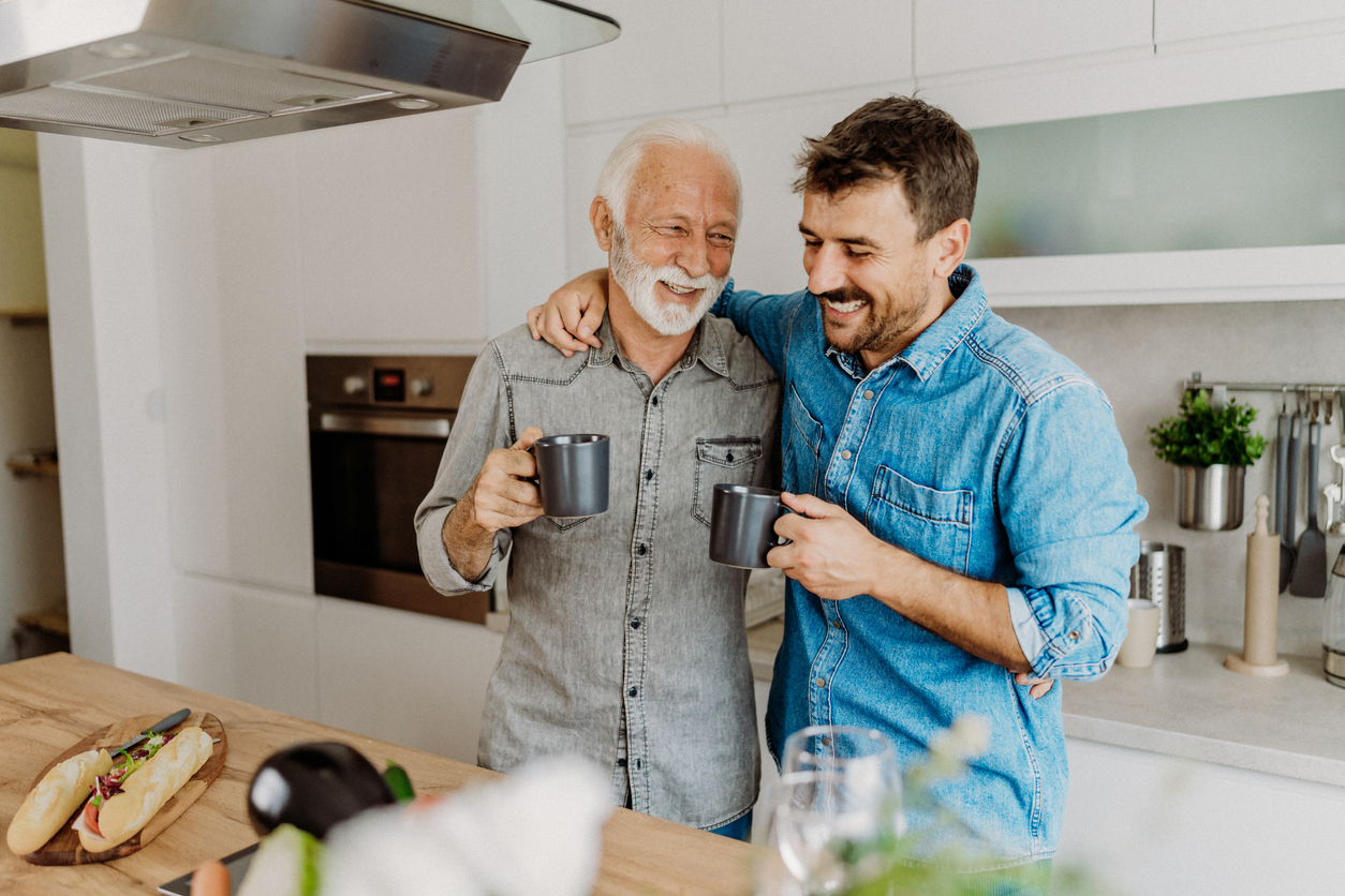 Father and son drinking coffee in the morning